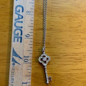 Vintage silver tone necklace chain with large rhinestone key charm, 19 inches